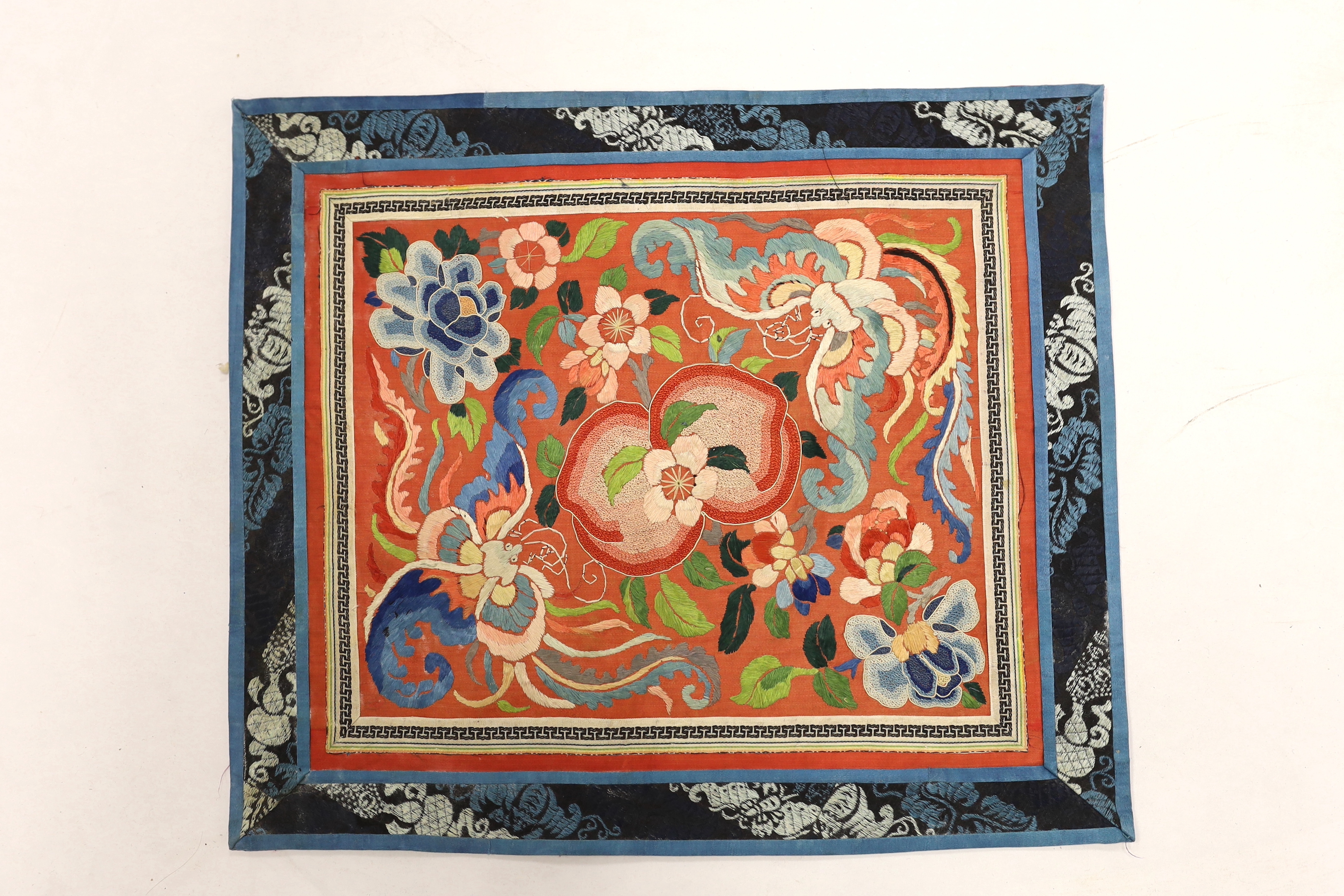 Six panels of Chinese silk embroidery, all using mixed stitches including Beijing knot, all bordered with silk brocade, largest 44cm x 38cm
